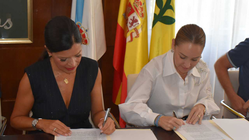 Mos y el Celta sellan el convenio para ampliar el vial a Cela